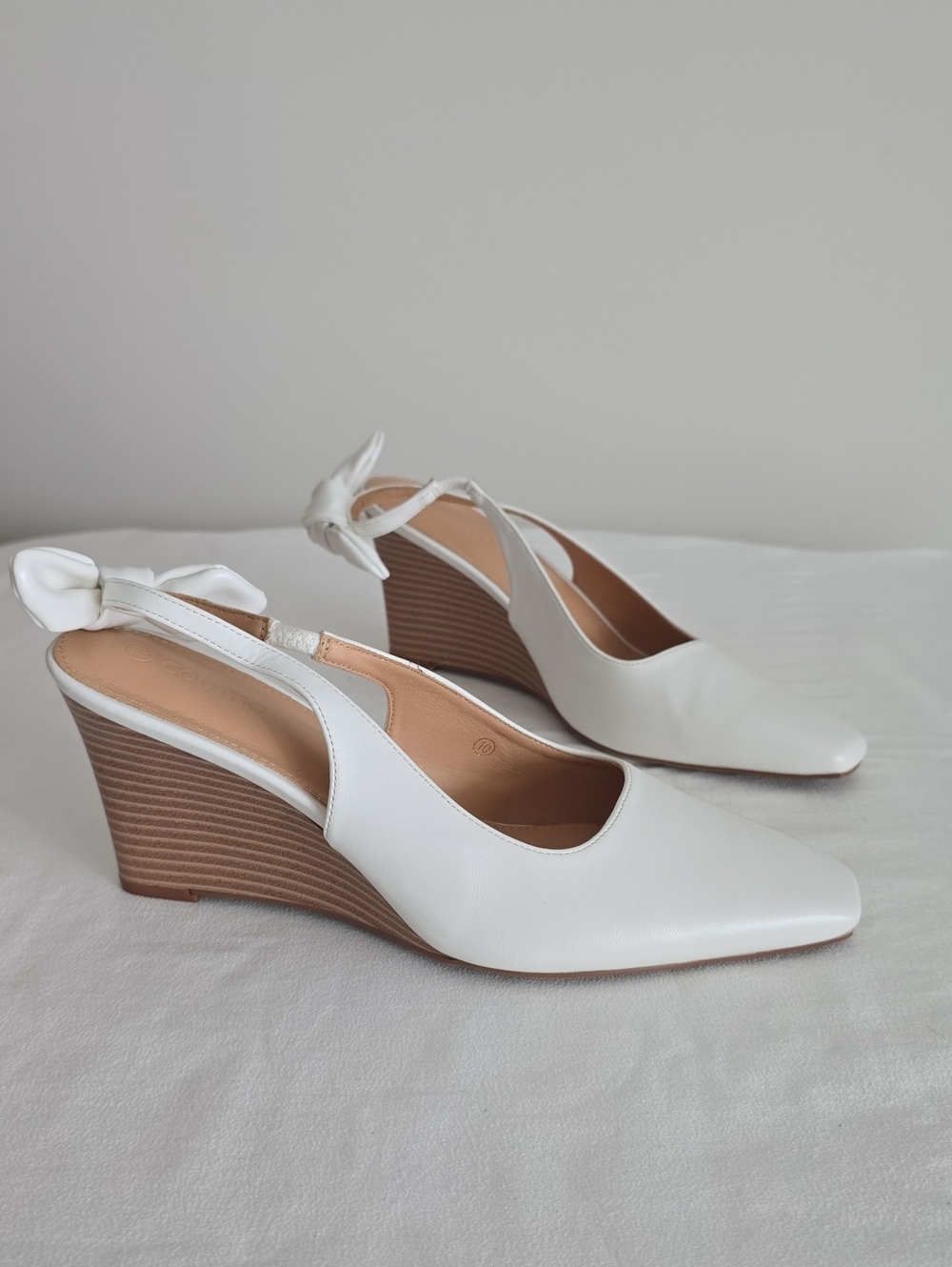 Classic White Slingback Wedge Pumps with Knot Detail. New